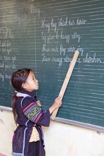 hmong child teaches-AsiaPhotoStock