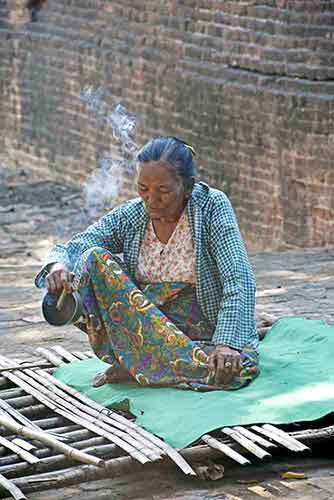 female smoking in bagan-AsiaPhotoStock