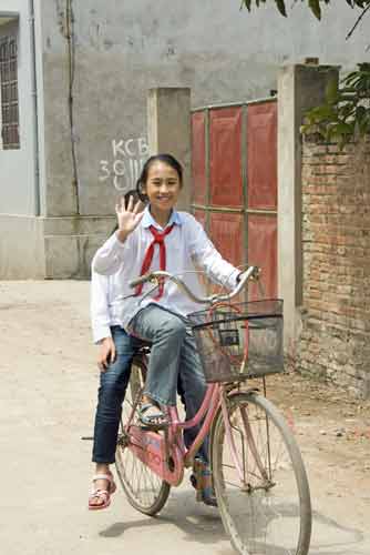 school girls on bikes-AsiaPhotoStock