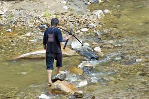 hmong hunter-AsiaPhotoStock