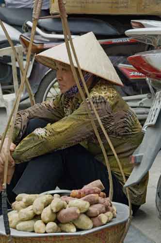 vegetable seller rests-AsiaPhotoStock