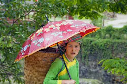 zay lady and umbrella-AsiaPhotoStock