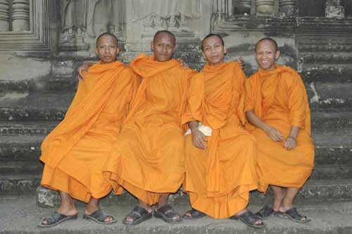 four happy monks-AsiaPhotoStock