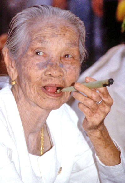 thai old lady smoking-AsiaPhotoStock