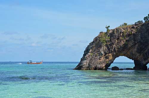 arch and boat koh khai-AsiaPhotoStock