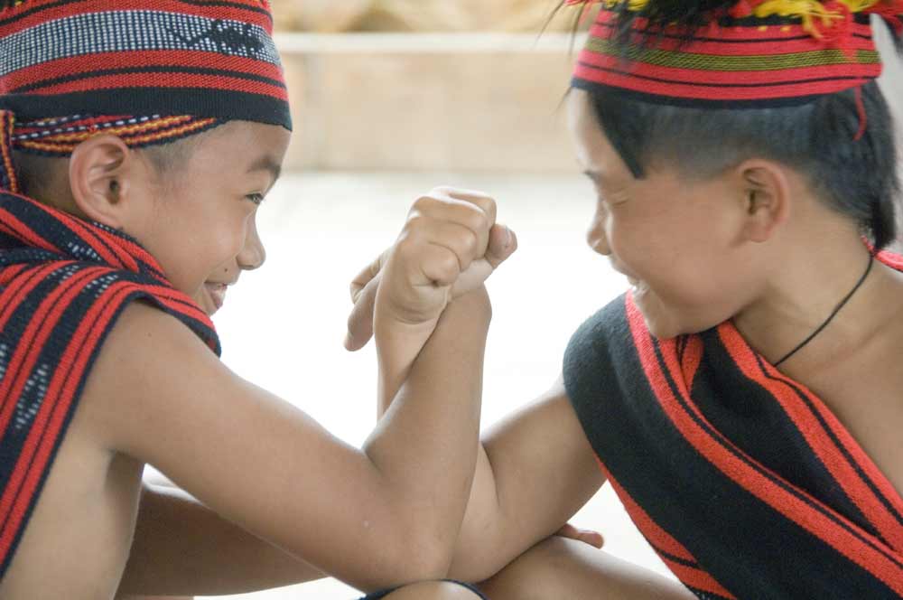 boys arm wrestling-AsiaPhotoStock