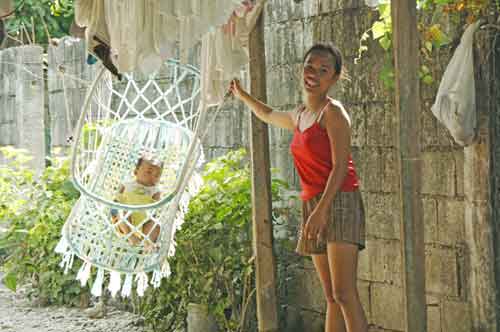 baby in crib-AsiaPhotoStock