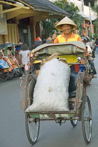 becak load-AsiaPhotoStock