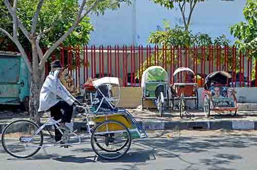 becak riders-AsiaPhotoStock