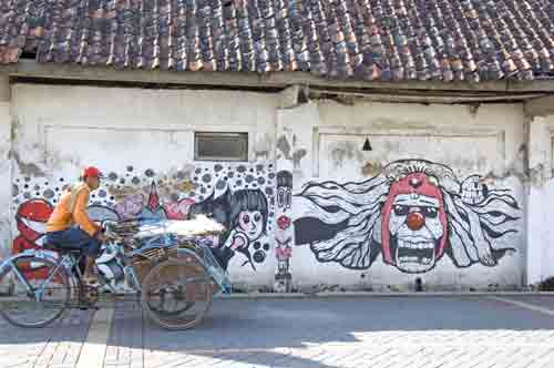 becak near wall-AsiaPhotoStock