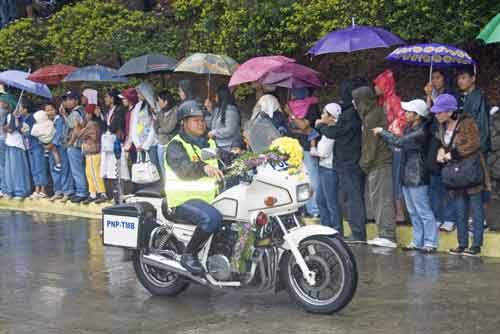 police flower power-AsiaPhotoStock