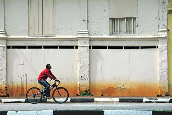 man on bike-AsiaPhotoStock