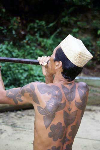 Malay iban with blowpipe-AsiaPhotoStock
