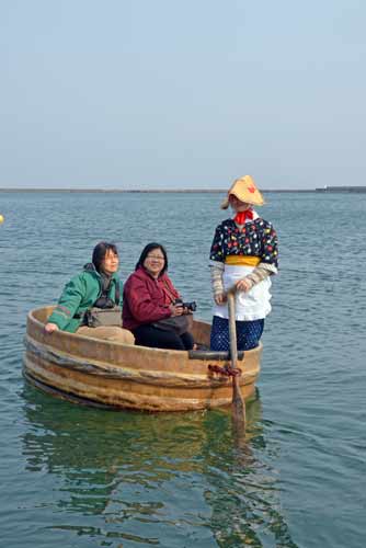 boat passengers-AsiaPhotoStock