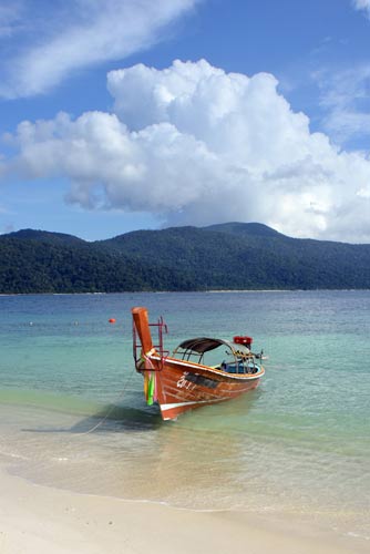 boating at koh rawi-AsiaPhotoStock