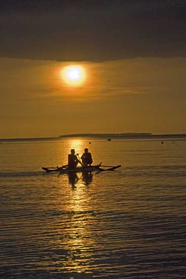 rower at sunrise-AsiaPhotoStock