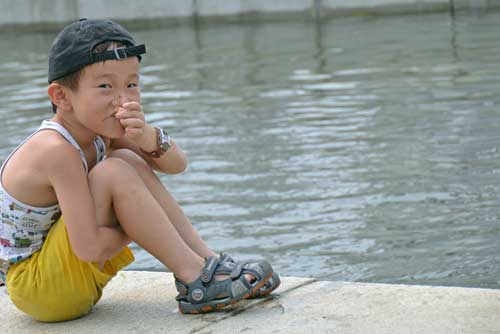 boy and dragonfly-AsiaPhotoStock