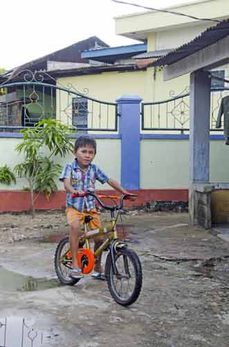 boy on bike-AsiaPhotoStock