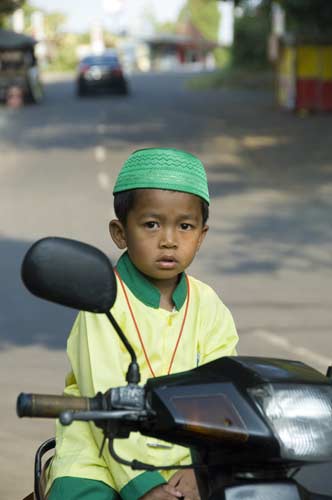 boy on motorbike-AsiaPhotoStock