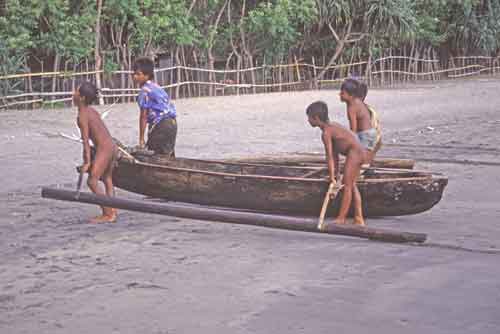 boys carrying boat-AsiaPhotoStock