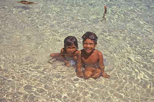 boys in sea-AsiaPhotoStock