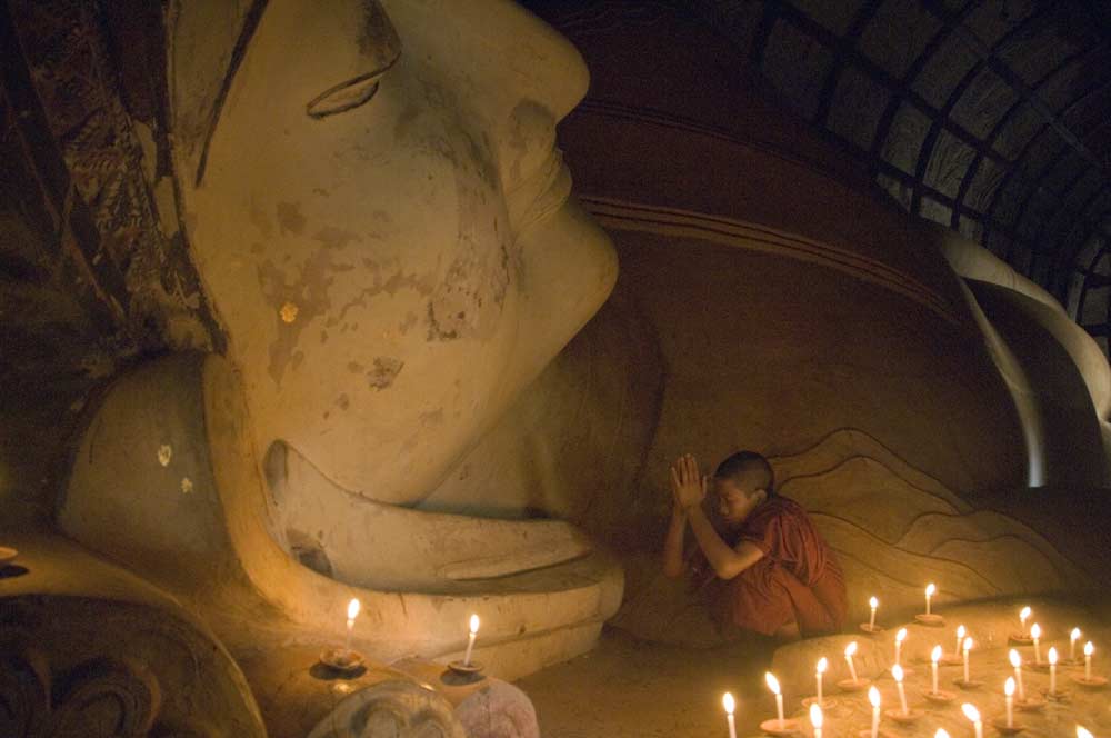 candles buddha-AsiaPhotoStock