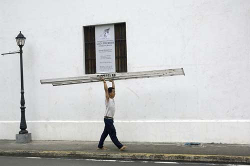 carrying a ladder-AsiaPhotoStock