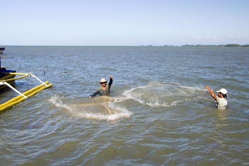 casting fish nets-AsiaPhotoStock