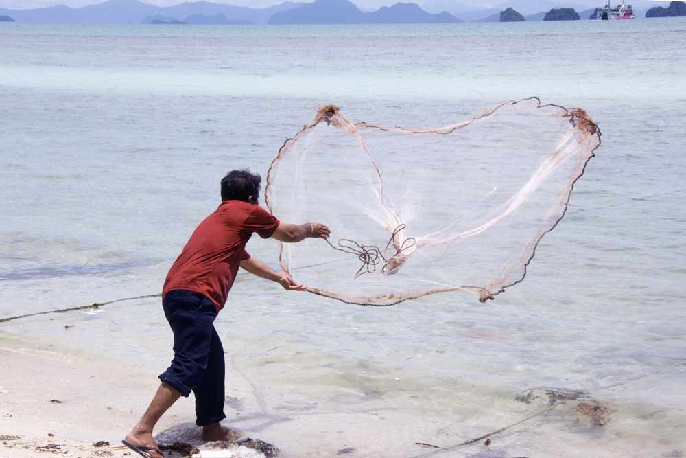 AsiaPhotoStock, casting fishing net