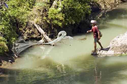 casting his net-AsiaPhotoStock