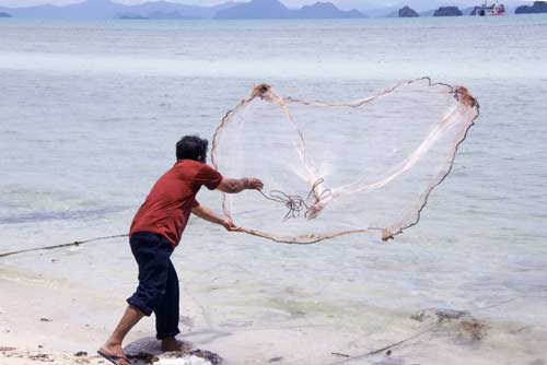 casting fishing net-AsiaPhotoStock