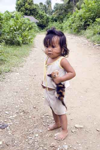 mangyan girl and cat-AsiaPhotoStock