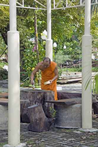 chores for monk-AsiaPhotoStock