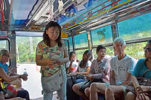 conductor on minibus-AsiaPhotoStock