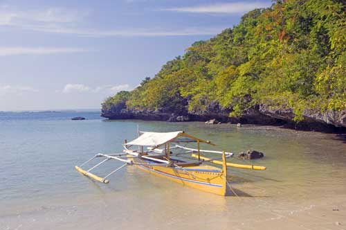 boat in cove-AsiaPhotoStock