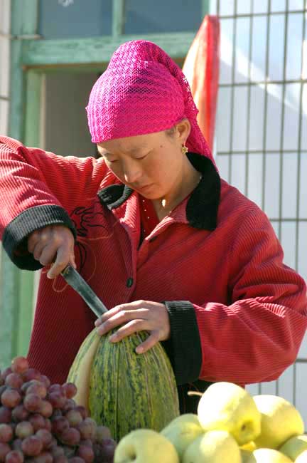 cutting melons-AsiaPhotoStock