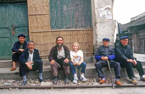 daxu men and tourist-AsiaPhotoStock