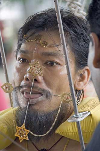 devotee pierced skin-AsiaPhotoStock