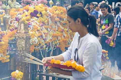 devotee erawan-AsiaPhotoStock