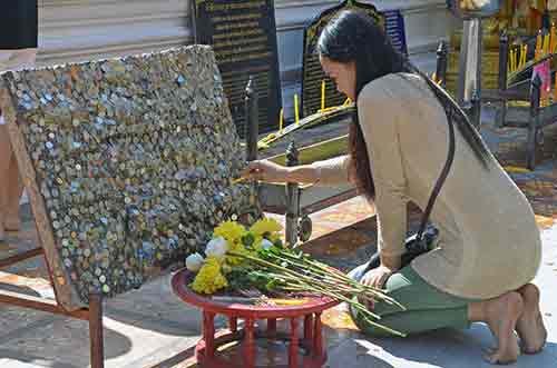 doi suthep coins-AsiaPhotoStock