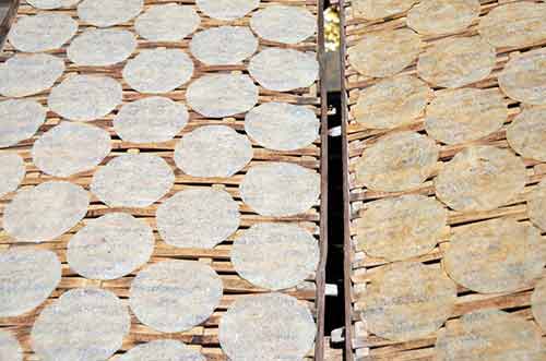 drying crackers in bali-AsiaPhotoStock