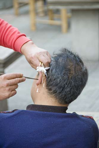 ear cleansing-AsiaPhotoStock