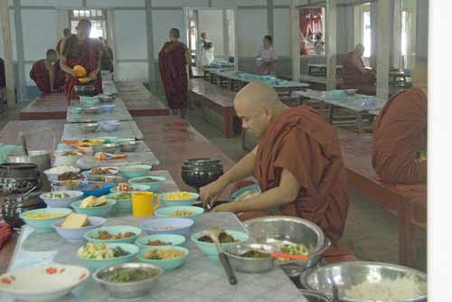 monk eating alone-AsiaPhotoStock