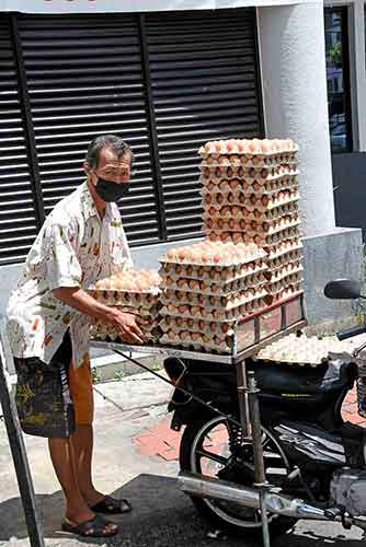 egg man penang-AsiaPhotoStock