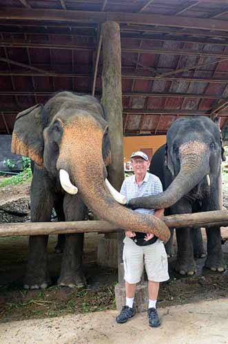 elephant hug-AsiaPhotoStock