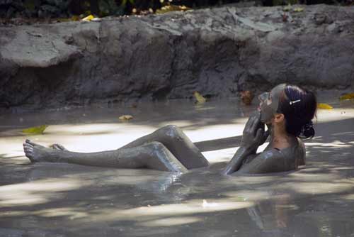 facial in mud bath-AsiaPhotoStock