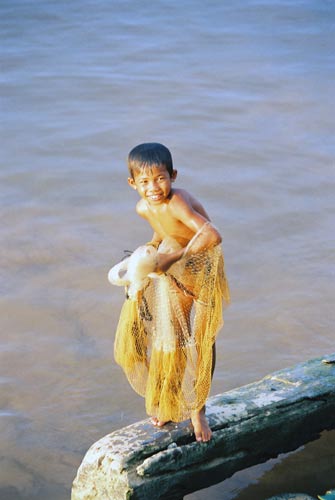 boy fishing with net-AsiaPhotoStock