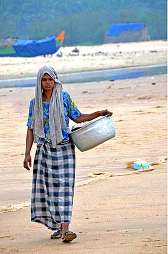 fisherwoman chowara-AsiaPhotoStock