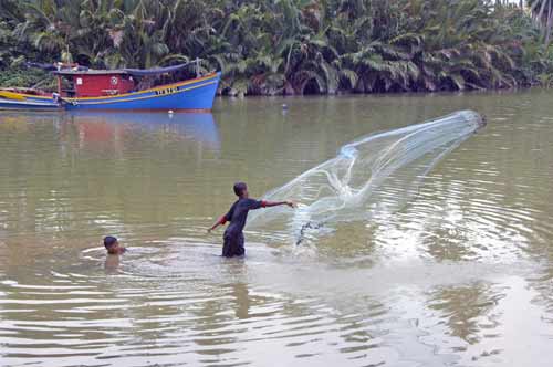 fishing with net-AsiaPhotoStock