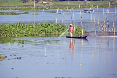 fishing with net-AsiaPhotoStock